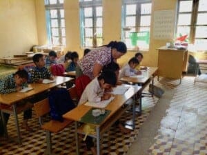 Teaching in Vietnamese schools.