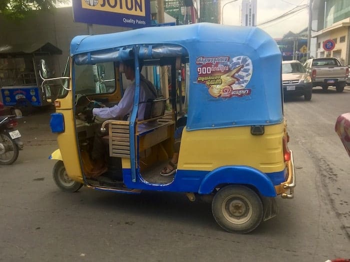 Advertising on Tuk-tuks,. Cambodia