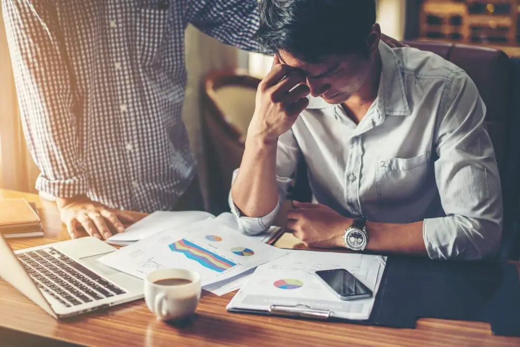 A young man was stressed because of the problem in the company.