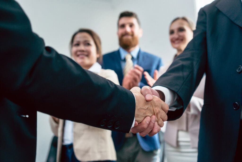 Business Partners Shaking Hands Together