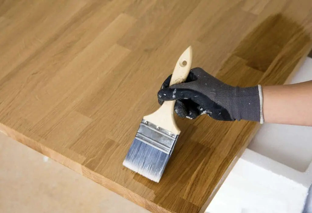 Applying a Varnish in a Furniture Wood