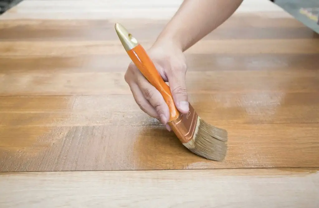 Applying a furniture into a table wood