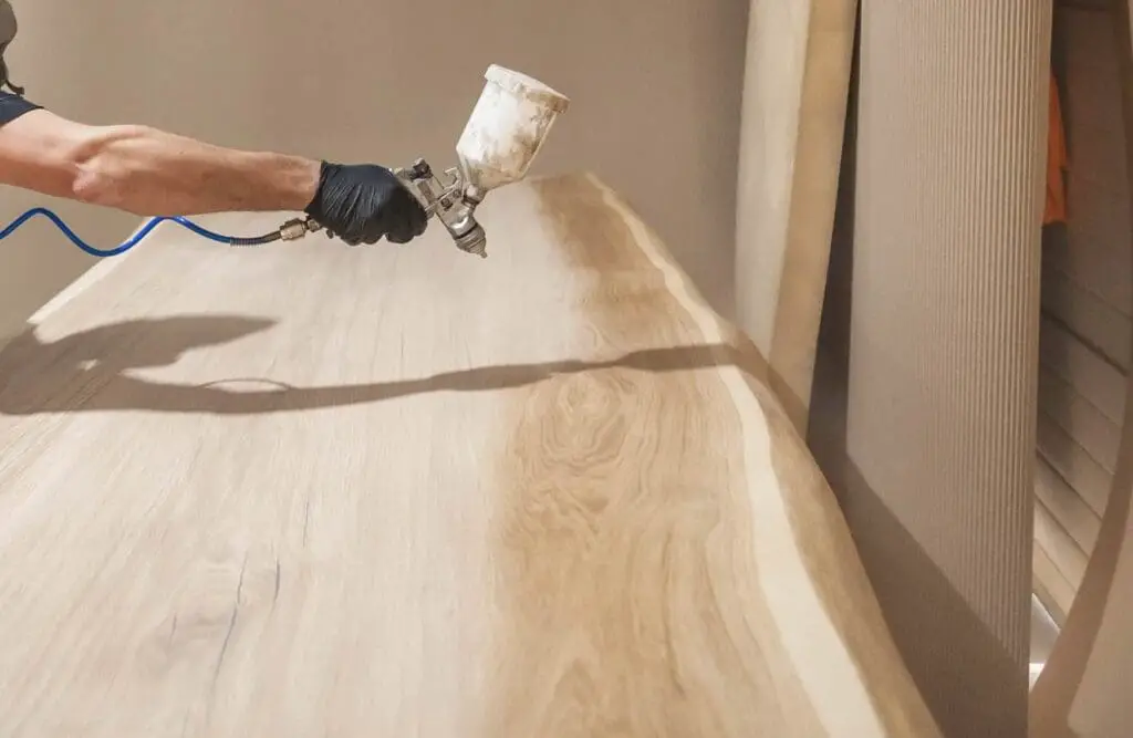 Spraying A Lacquer Into A  Furniture