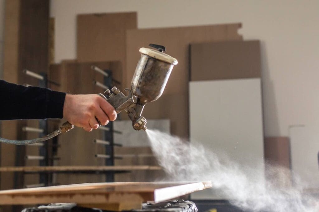 Spraying Lacquer On The Wood